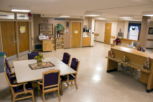 Pathways main unit area with desks, a table and chairs